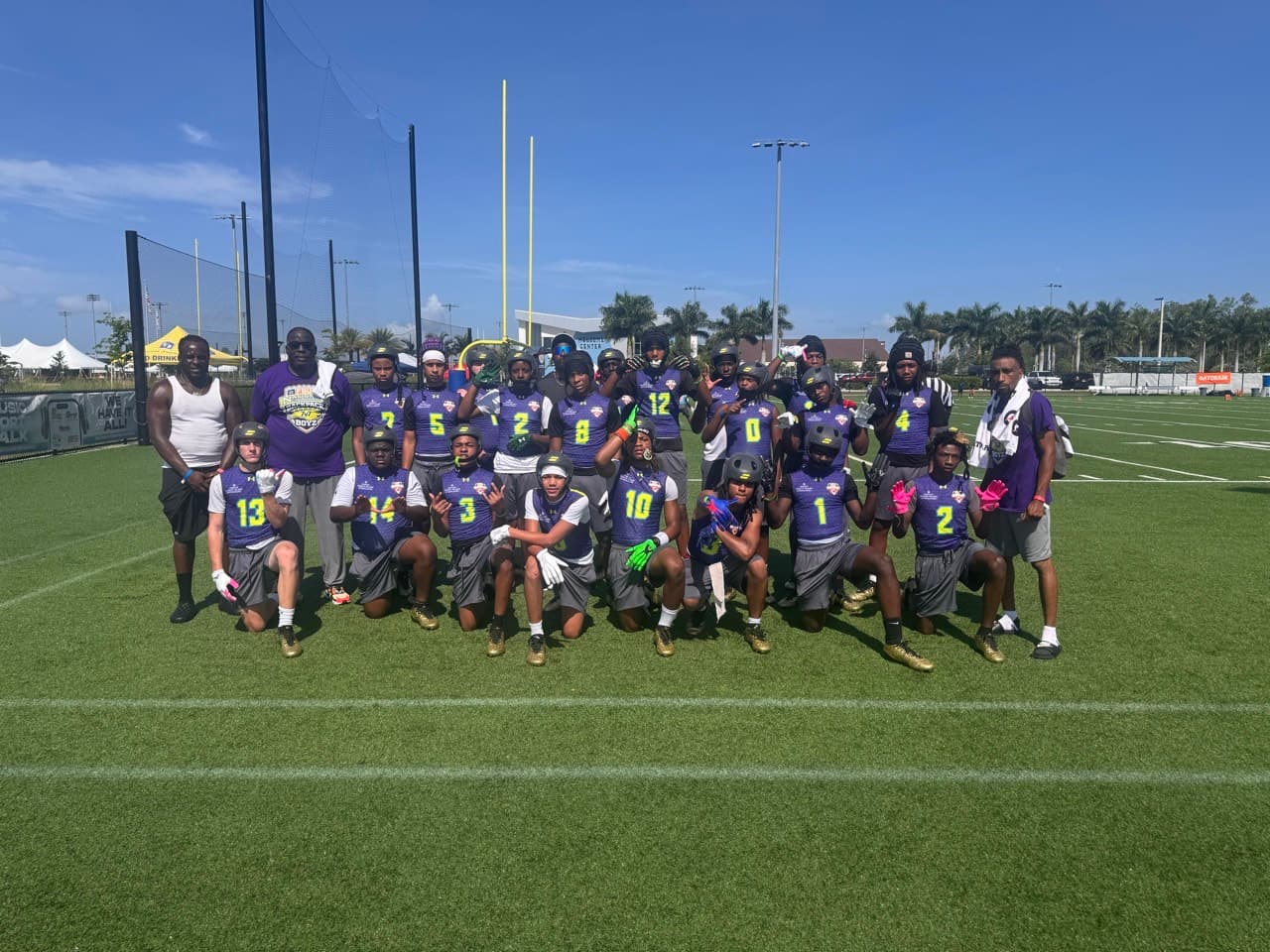 FBU Team Carolina Backpack Boyz 7v7 team and coaches on the field at the national championship